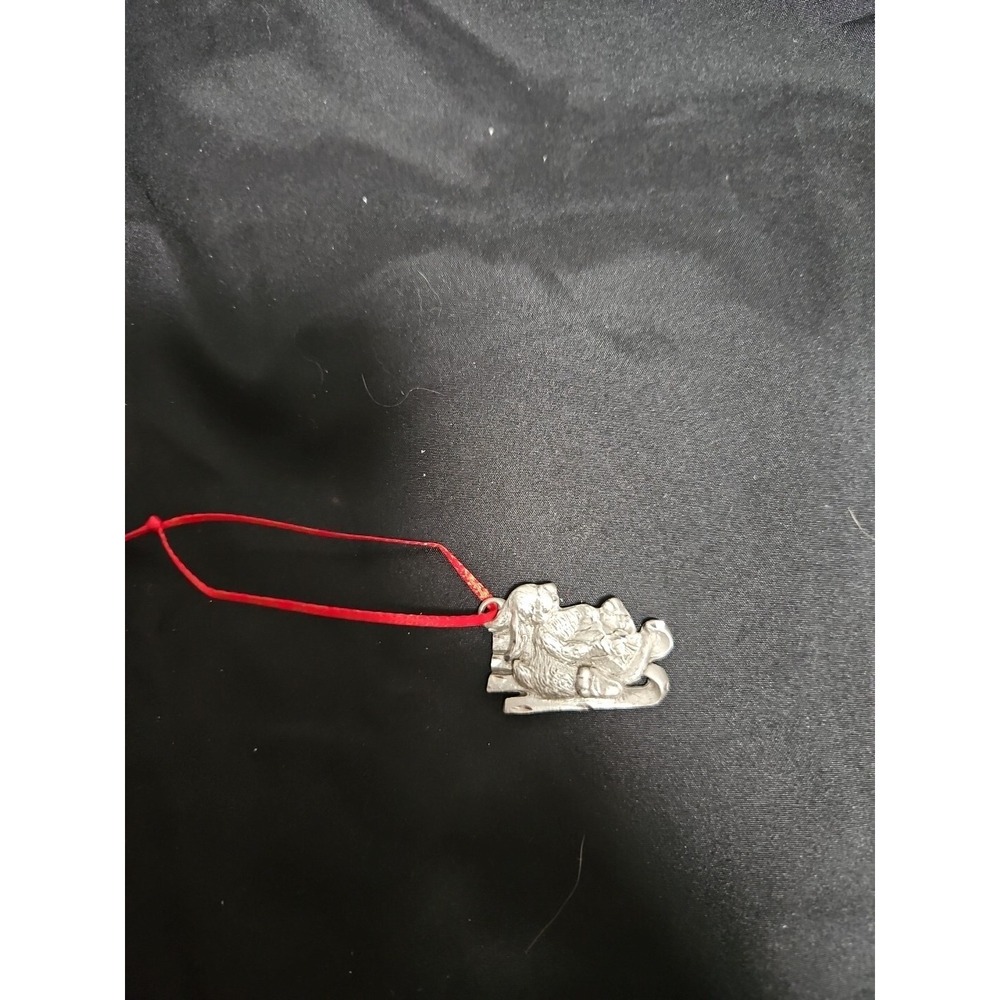 Rawcliffe Pewter Bunny on a Sled ornament. Diamond cut.